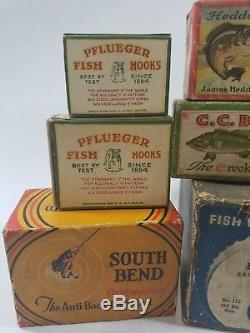 8 Old fishing reel and lure paper boxes / Heddon, Pflueger, Zebco & South Bend