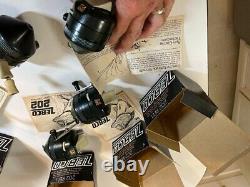 LOT 5 Zebco Model 202 (4) NIB with papers, bonus Zeb 404 preowned See Picts