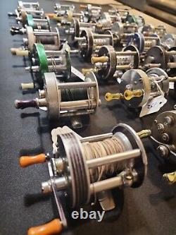 Lot of 28 vintage fishing reels mainly Langley, Zebco, and a few Shakespeares