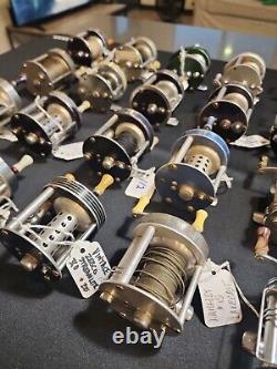 Lot of 28 vintage fishing reels mainly Langley, Zebco, and a few Shakespeares