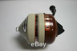 Vintage Zebco 808 Brown Metal Foot Spin-Cast Fishing Reel. Excellent! NOS # 22