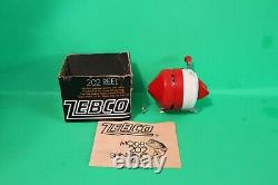 Zebco 202 Christmas Reel NIB with papers