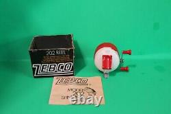 Zebco 202 Christmas Reel NIB with papers
