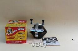 Zebco 33 Reel in box with papers used- with brown covers