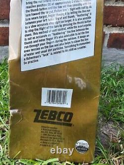 Zebco 40th Anniversary Limited Edition combo with belt buckle. NOS