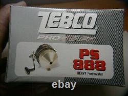 Zebco 888 PS 1999 last USA 888, new in box with paperwork, gold tone. 4 reels