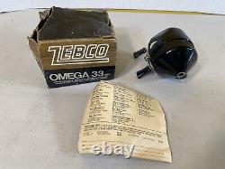 Zebco Omega 43XBL stainless 404 fishing Spin-Cast Reel conventional size 11B78
