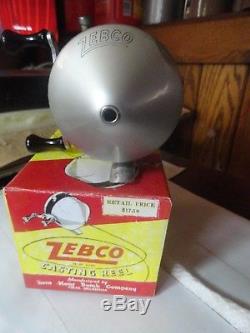 Zebco standard reel with the black spinnerhead the first model very good shape