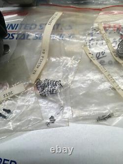 Lot de pièces de moulinet de pêche Zebco Quantum vintage discontinuées d'une valeur de plus de 400,00 $.